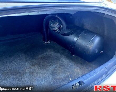 Білий Міцубісі Lancer, об'ємом двигуна 1.5 л та пробігом 218 тис. км за 6000 $, фото 4 на Automoto.ua