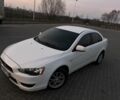 Білий Міцубісі Lancer, об'ємом двигуна 0.15 л та пробігом 190 тис. км за 5800 $, фото 1 на Automoto.ua