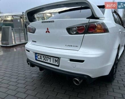 Білий Міцубісі Lancer, об'ємом двигуна 2 л та пробігом 225 тис. км за 7800 $, фото 7 на Automoto.ua
