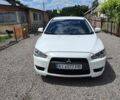 Белый Мицубиси Лансер, объемом двигателя 2 л и пробегом 273 тыс. км за 7300 $, фото 1 на Automoto.ua