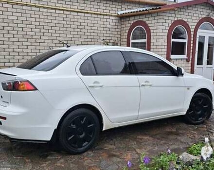 Белый Мицубиси Лансер, объемом двигателя 1.5 л и пробегом 160 тыс. км за 7600 $, фото 6 на Automoto.ua