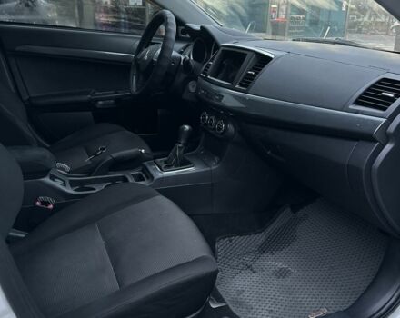 Белый Мицубиси Лансер, объемом двигателя 2 л и пробегом 225 тыс. км за 7800 $, фото 12 на Automoto.ua