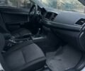 Белый Мицубиси Лансер, объемом двигателя 2 л и пробегом 225 тыс. км за 7800 $, фото 12 на Automoto.ua