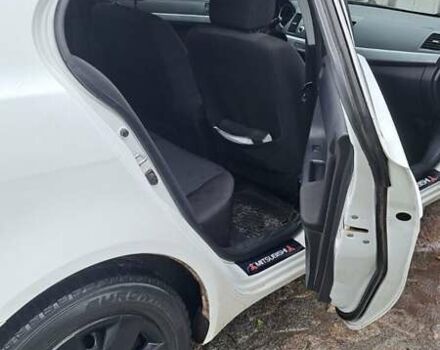 Белый Мицубиси Лансер, объемом двигателя 1.5 л и пробегом 160 тыс. км за 7600 $, фото 15 на Automoto.ua