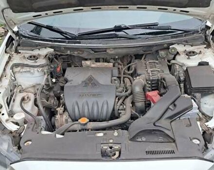 Белый Мицубиси Лансер, объемом двигателя 1.5 л и пробегом 160 тыс. км за 7600 $, фото 16 на Automoto.ua