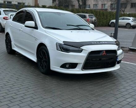 Белый Мицубиси Лансер, объемом двигателя 2 л и пробегом 225 тыс. км за 7800 $, фото 2 на Automoto.ua
