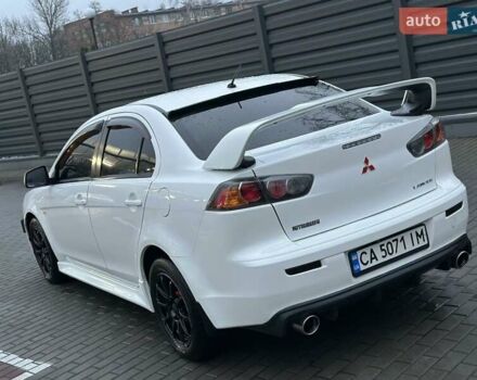 Білий Міцубісі Lancer, об'ємом двигуна 2 л та пробігом 225 тис. км за 7800 $, фото 4 на Automoto.ua