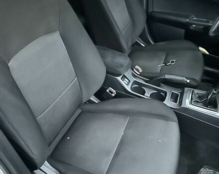 Белый Мицубиси Лансер, объемом двигателя 2 л и пробегом 225 тыс. км за 7800 $, фото 13 на Automoto.ua