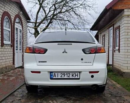Белый Мицубиси Лансер, объемом двигателя 1.5 л и пробегом 160 тыс. км за 7600 $, фото 2 на Automoto.ua