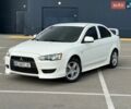 Белый Мицубиси Лансер, объемом двигателя 1.5 л и пробегом 197 тыс. км за 6999 $, фото 1 на Automoto.ua