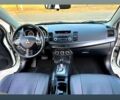 Білий Міцубісі Lancer, об'ємом двигуна 20 л та пробігом 183 тис. км за 9899 $, фото 5 на Automoto.ua