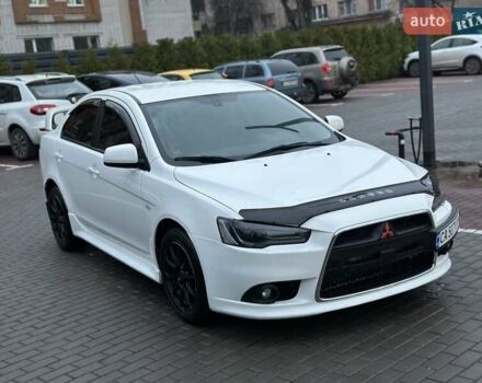Білий Міцубісі Lancer, об'ємом двигуна 2 л та пробігом 225 тис. км за 7800 $, фото 1 на Automoto.ua