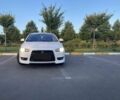 Білий Міцубісі Lancer, об'ємом двигуна 1.5 л та пробігом 218 тис. км за 6000 $, фото 1 на Automoto.ua