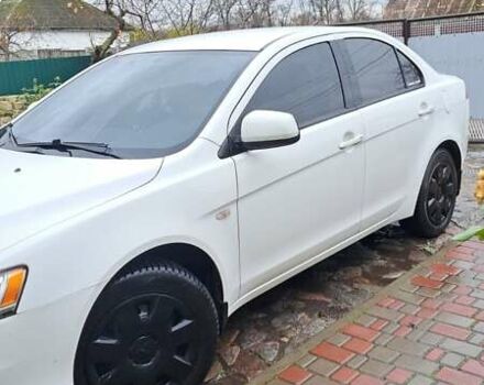 Белый Мицубиси Лансер, объемом двигателя 1.5 л и пробегом 160 тыс. км за 7600 $, фото 8 на Automoto.ua