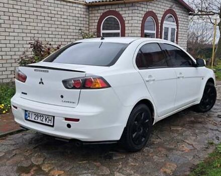 Белый Мицубиси Лансер, объемом двигателя 1.5 л и пробегом 160 тыс. км за 7600 $, фото 7 на Automoto.ua