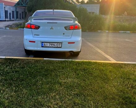 Білий Міцубісі Lancer, об'ємом двигуна 1.5 л та пробігом 218 тис. км за 6000 $, фото 1 на Automoto.ua
