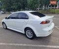 Білий Міцубісі Lancer, об'ємом двигуна 2 л та пробігом 208 тис. км за 7000 $, фото 1 на Automoto.ua