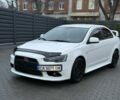 Белый Мицубиси Лансер, объемом двигателя 2 л и пробегом 225 тыс. км за 7800 $, фото 1 на Automoto.ua