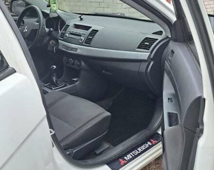 Белый Мицубиси Лансер, объемом двигателя 1.5 л и пробегом 160 тыс. км за 7600 $, фото 12 на Automoto.ua