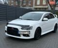 Білий Міцубісі Lancer, об'ємом двигуна 2 л та пробігом 225 тис. км за 7800 $, фото 1 на Automoto.ua