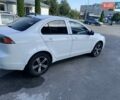 Белый Мицубиси Лансер, объемом двигателя 1.5 л и пробегом 158 тыс. км за 8300 $, фото 1 на Automoto.ua