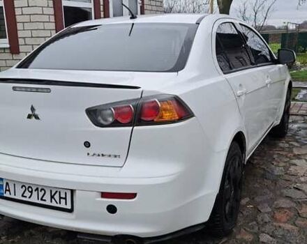 Белый Мицубиси Лансер, объемом двигателя 1.5 л и пробегом 160 тыс. км за 7600 $, фото 5 на Automoto.ua