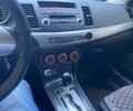 Білий Міцубісі Lancer, об'ємом двигуна 1.5 л та пробігом 218 тис. км за 6000 $, фото 3 на Automoto.ua