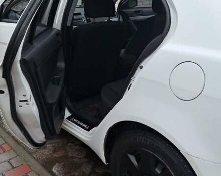 Белый Мицубиси Лансер, объемом двигателя 1.5 л и пробегом 160 тыс. км за 7600 $, фото 14 на Automoto.ua