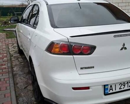 Белый Мицубиси Лансер, объемом двигателя 1.5 л и пробегом 160 тыс. км за 7600 $, фото 4 на Automoto.ua