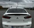 Білий Міцубісі Lancer, об'ємом двигуна 1.5 л та пробігом 200 тис. км за 6000 $, фото 1 на Automoto.ua