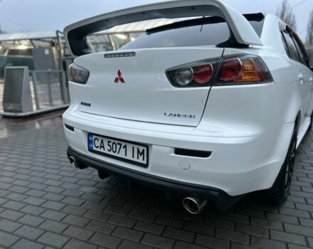 Белый Мицубиси Лансер, объемом двигателя 2 л и пробегом 225 тыс. км за 7800 $, фото 8 на Automoto.ua