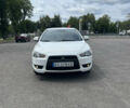 Білий Міцубісі Lancer, об'ємом двигуна 1.5 л та пробігом 190 тис. км за 6000 $, фото 1 на Automoto.ua