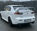 Белый Мицубиси Лансер, объемом двигателя 2 л и пробегом 225 тыс. км за 7800 $, фото 6 на Automoto.ua