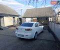 Белый Мицубиси Лансер, объемом двигателя 1.5 л и пробегом 163 тыс. км за 6750 $, фото 25 на Automoto.ua