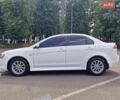 Білий Міцубісі Lancer, об'ємом двигуна 2 л та пробігом 208 тис. км за 6500 $, фото 2 на Automoto.ua
