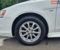Білий Міцубісі Lancer, об'ємом двигуна 2 л та пробігом 208 тис. км за 6500 $, фото 24 на Automoto.ua