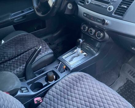 Білий Міцубісі Lancer, об'ємом двигуна 1.5 л та пробігом 218 тис. км за 6000 $, фото 8 на Automoto.ua