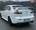 Білий Міцубісі Lancer, об'ємом двигуна 2 л та пробігом 225 тис. км за 7800 $, фото 5 на Automoto.ua
