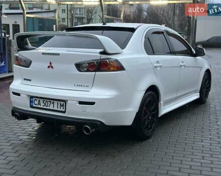 Білий Міцубісі Lancer, об'ємом двигуна 2 л та пробігом 225 тис. км за 7800 $, фото 6 на Automoto.ua