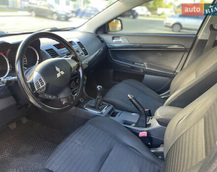 Білий Міцубісі Lancer, об'ємом двигуна 1.6 л та пробігом 205 тис. км за 4750 $, фото 21 на Automoto.ua