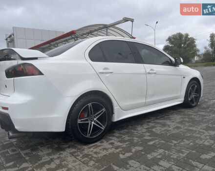 Білий Міцубісі Lancer, об'ємом двигуна 1.6 л та пробігом 231 тис. км за 6900 $, фото 10 на Automoto.ua