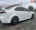 Білий Міцубісі Lancer, об'ємом двигуна 1.6 л та пробігом 231 тис. км за 6900 $, фото 10 на Automoto.ua