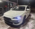 Белый Мицубиси Лансер, объемом двигателя 1.6 л и пробегом 301 тыс. км за 7000 $, фото 1 на Automoto.ua