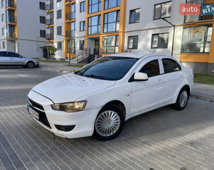 Білий Міцубісі Lancer, об'ємом двигуна 1.6 л та пробігом 205 тис. км за 4750 $, фото 7 на Automoto.ua