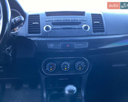 Білий Міцубісі Lancer, об'ємом двигуна 1.6 л та пробігом 205 тис. км за 4750 $, фото 22 на Automoto.ua