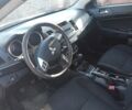 Білий Міцубісі Lancer, об'ємом двигуна 1.6 л та пробігом 220 тис. км за 6500 $, фото 1 на Automoto.ua