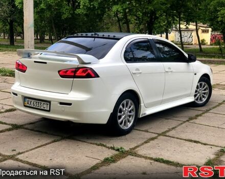 Білий Міцубісі Lancer, об'ємом двигуна 1.8 л та пробігом 169 тис. км за 8999 $, фото 4 на Automoto.ua