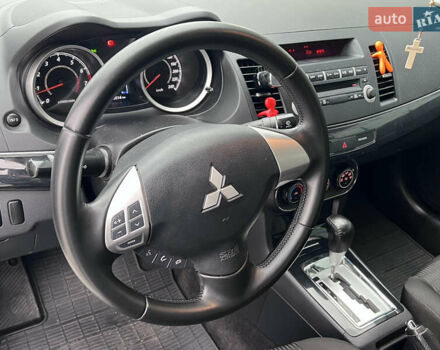 Белый Мицубиси Лансер, объемом двигателя 1.59 л и пробегом 145 тыс. км за 7500 $, фото 16 на Automoto.ua