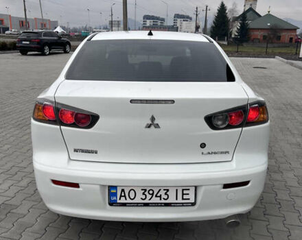 Белый Мицубиси Лансер, объемом двигателя 1.59 л и пробегом 145 тыс. км за 7500 $, фото 2 на Automoto.ua