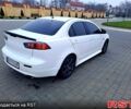 Белый Мицубиси Лансер, объемом двигателя 2 л и пробегом 188 тыс. км за 7700 $, фото 3 на Automoto.ua